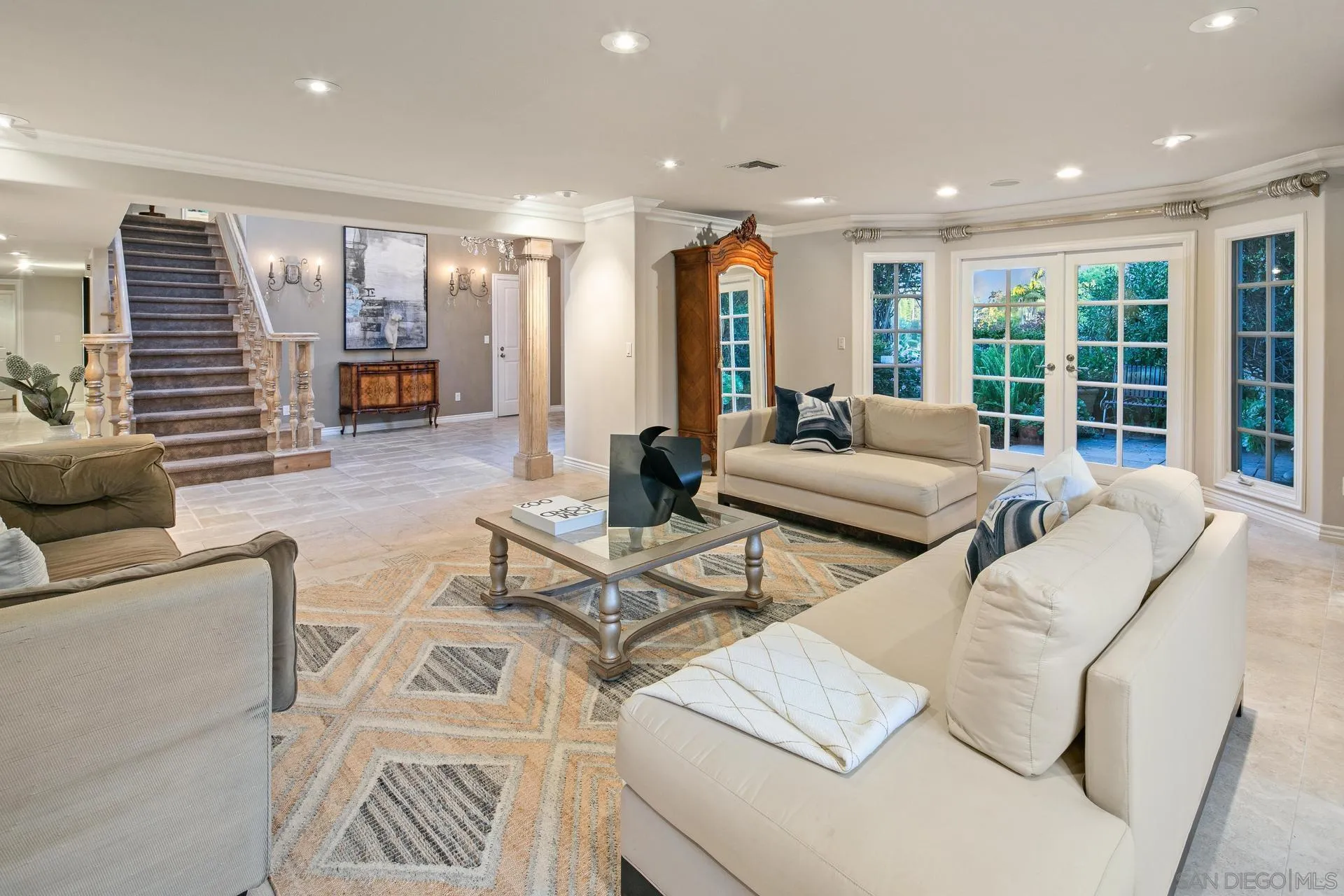 8491 Cliffridge Lane La Jolla, CA 92037 - Photo 10 of 38 a living room with furniture and large window
