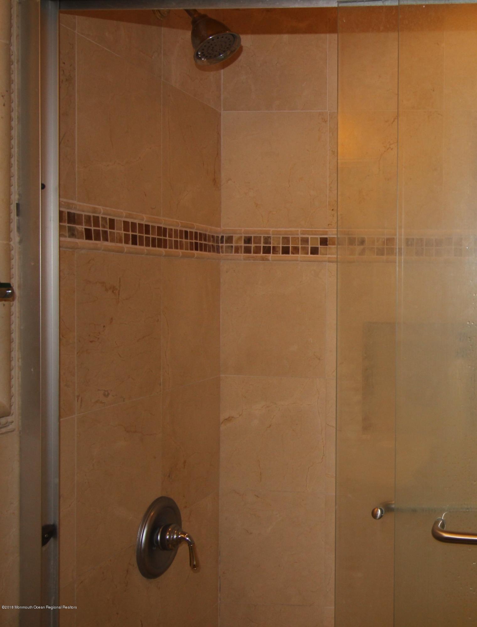 2007 Ridgeview Court, Unit 2007 Parlin, NJ 08859 - Photo 15 of 21 a close view of a shower in the bathroom