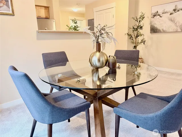 a bedroom with a bed and a table