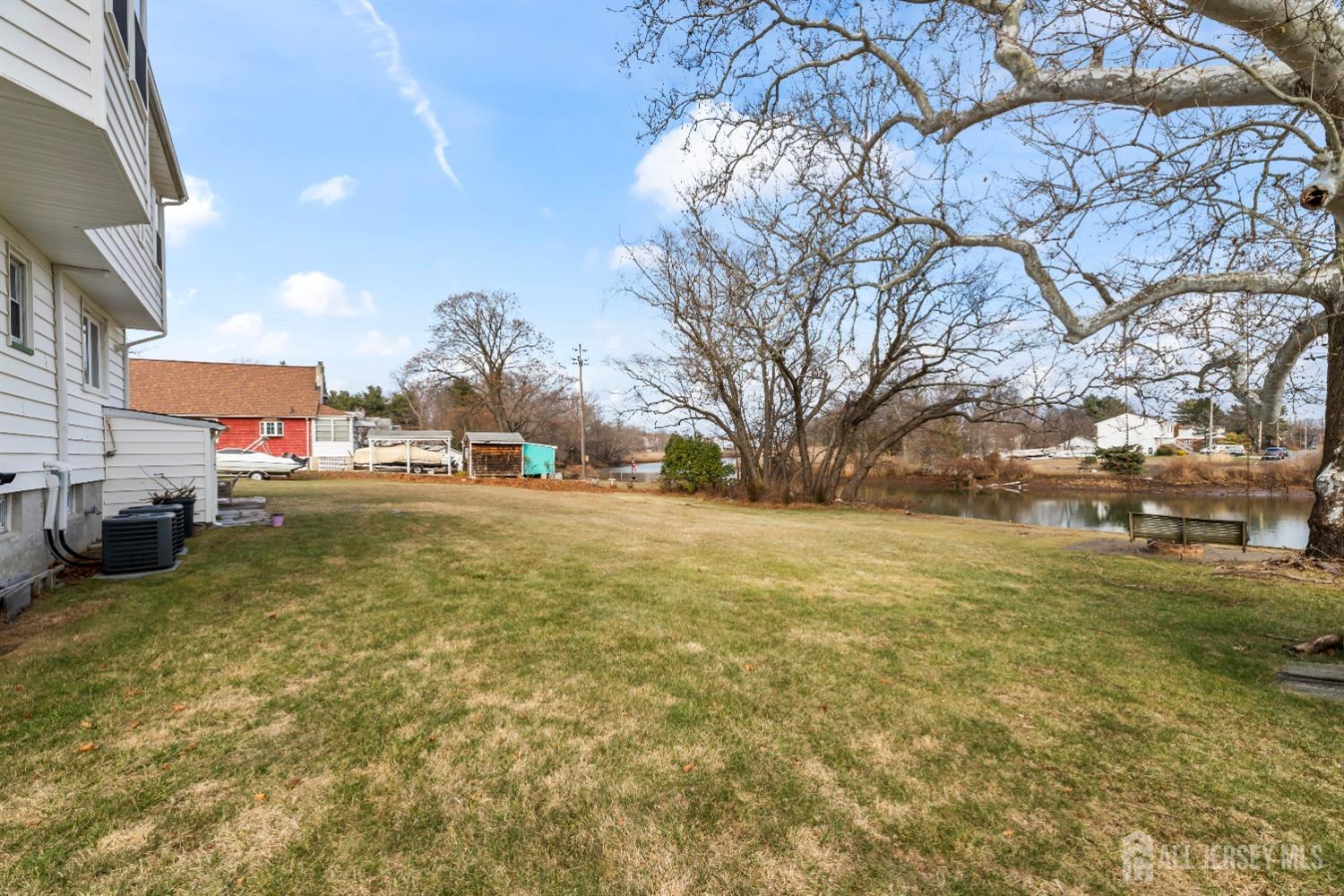 28 River Road East Brunswick, NJ 08816 - Photo 37 of 46 a view of an outdoor space and yard