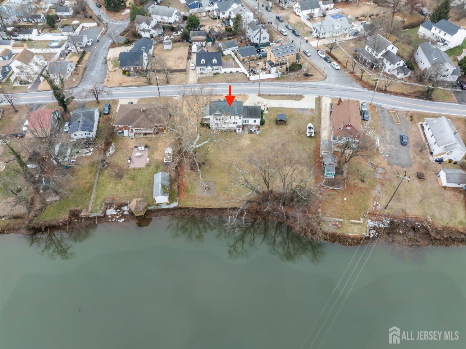 28 River Road East Brunswick, NJ 08816 - Photo 44 of 46 an aerial view of residential houses with outdoor space