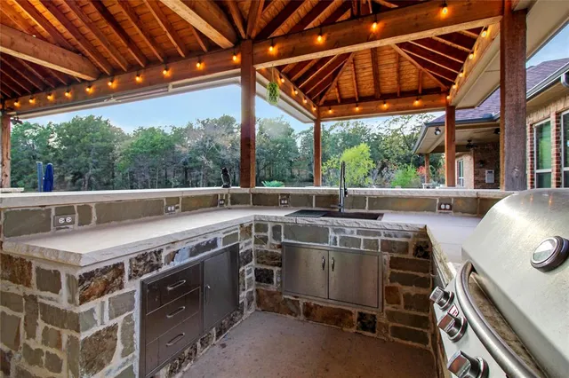 a view of an outdoor kitchen