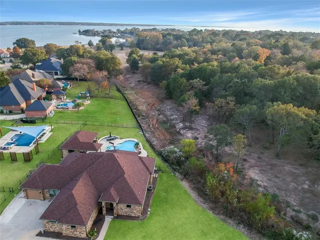 an aerial view of a house with a garden