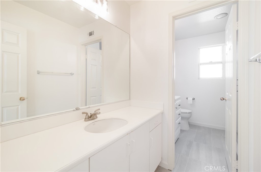 51 Santa Lucia Dana Point, CA 92629 - Photo 13 of 50 a bathroom with a sink and a toilet