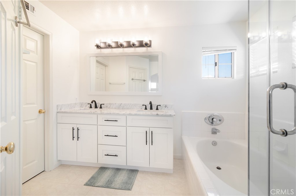 51 Santa Lucia Dana Point, CA 92629 - Photo 20 of 50 a spacious bathroom with a tub sink and mirror