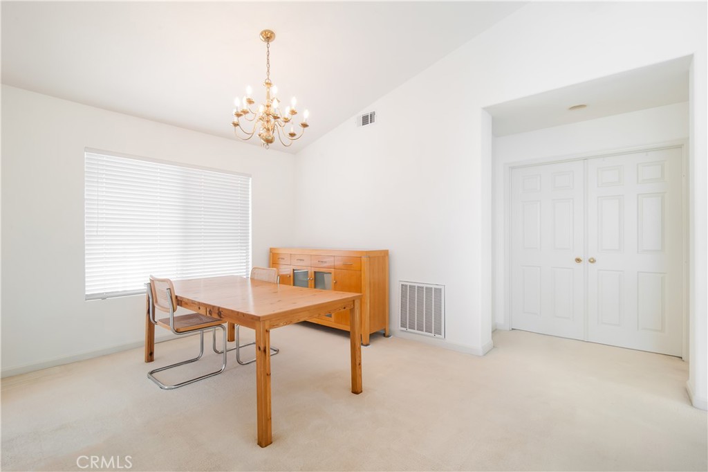 51 Santa Lucia Dana Point, CA 92629 - Photo 22 of 50 a view of a room with furniture and a chandelier