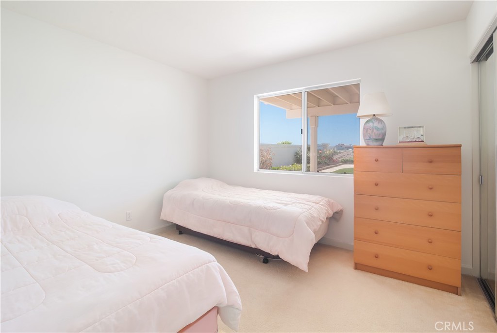 51 Santa Lucia Dana Point, CA 92629 - Photo 32 of 50 a bedroom with two beds and a dresser