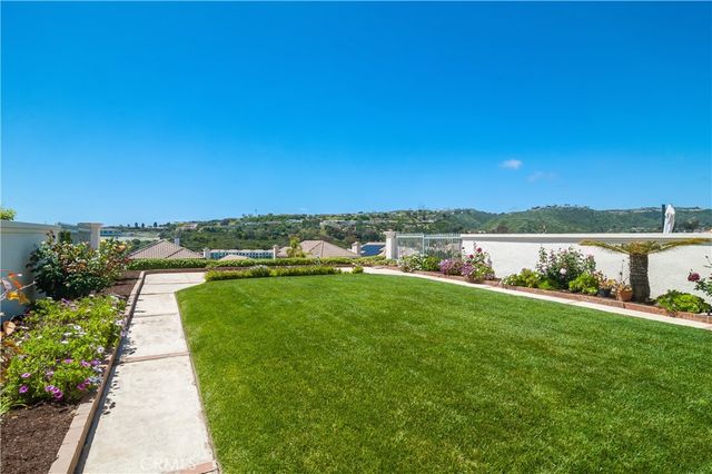 a view of a lake with a big yard