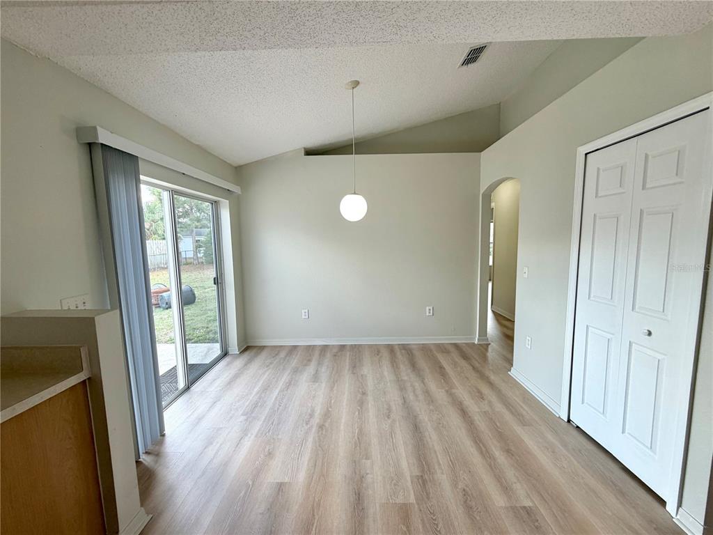 12052 Villa Road Spring Hill, FL 34609 - Photo 22 of 50 a view of entryway with wooden floor