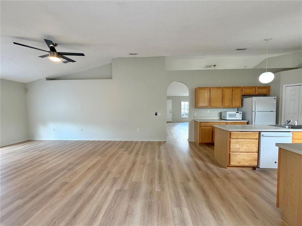 12052 Villa Road Spring Hill, FL 34609 - Photo 34 of 50 a open kitchen with kitchen island a sink stainless steel appliances and cabinets