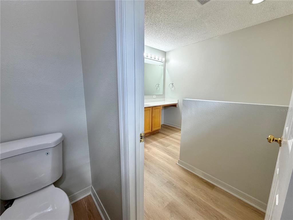 12052 Villa Road Spring Hill, FL 34609 - Photo 45 of 50 a bathroom with a toilet and a tub