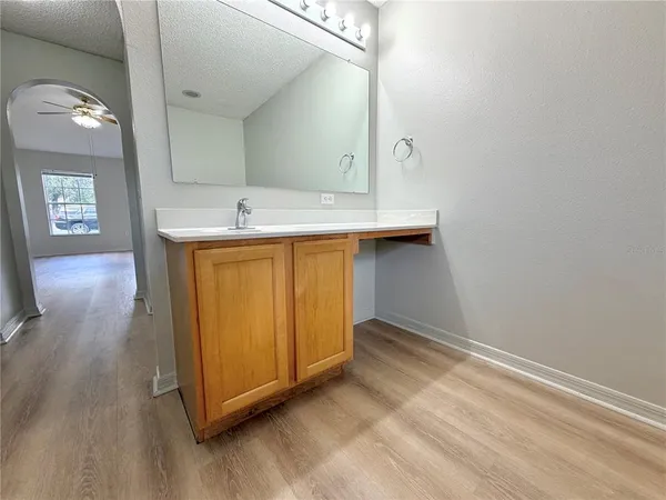 a white bath tub sitting in a bathroom