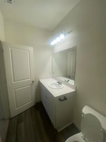 a bathroom with a bathtub and sink