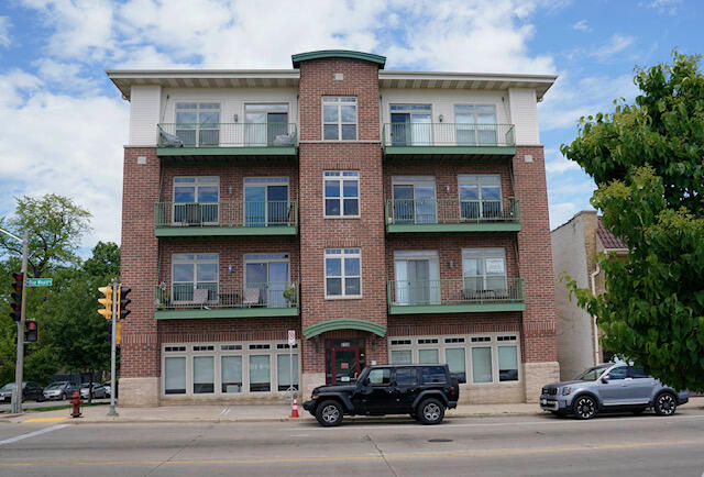 5128 West Bluemound Road, Unit 201 Milwaukee, WI 53208 - Photo 1 of 18 Front of building