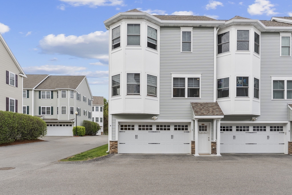50 Des Moines Road, Unit H1 Quincy, MA 02169 - Photo 24 of 40 a view of building with windows