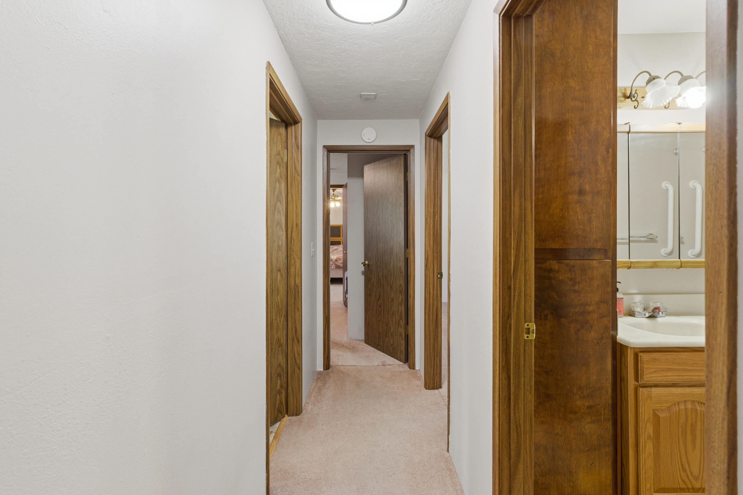 50868 Doe Loop La Pine, OR 97739 - Photo 20 of 51 a view of a bathroom from a hallway