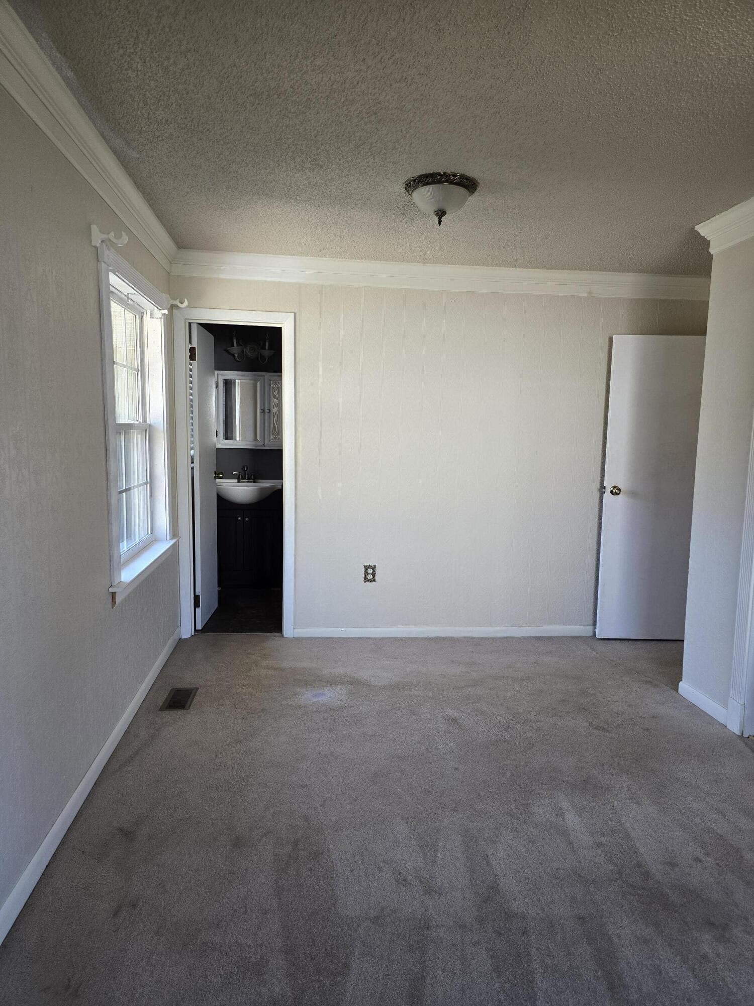 6063 Spring Place Road Southeast Cleveland, TN 37323 - Photo 23 of 44 a view of an empty room with a window