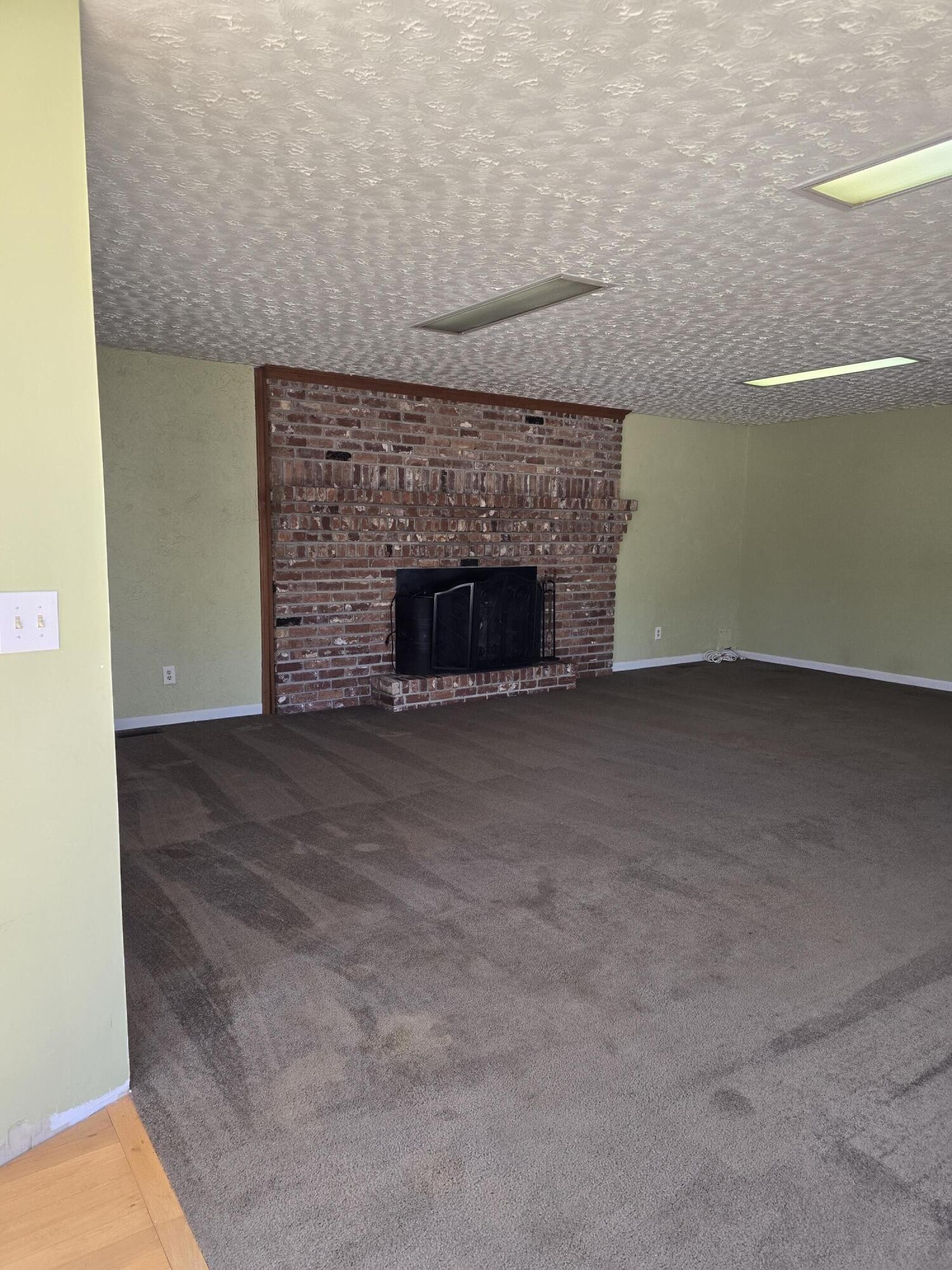 6063 Spring Place Road Southeast Cleveland, TN 37323 - Photo 30 of 44 a view of empty room with a fireplace