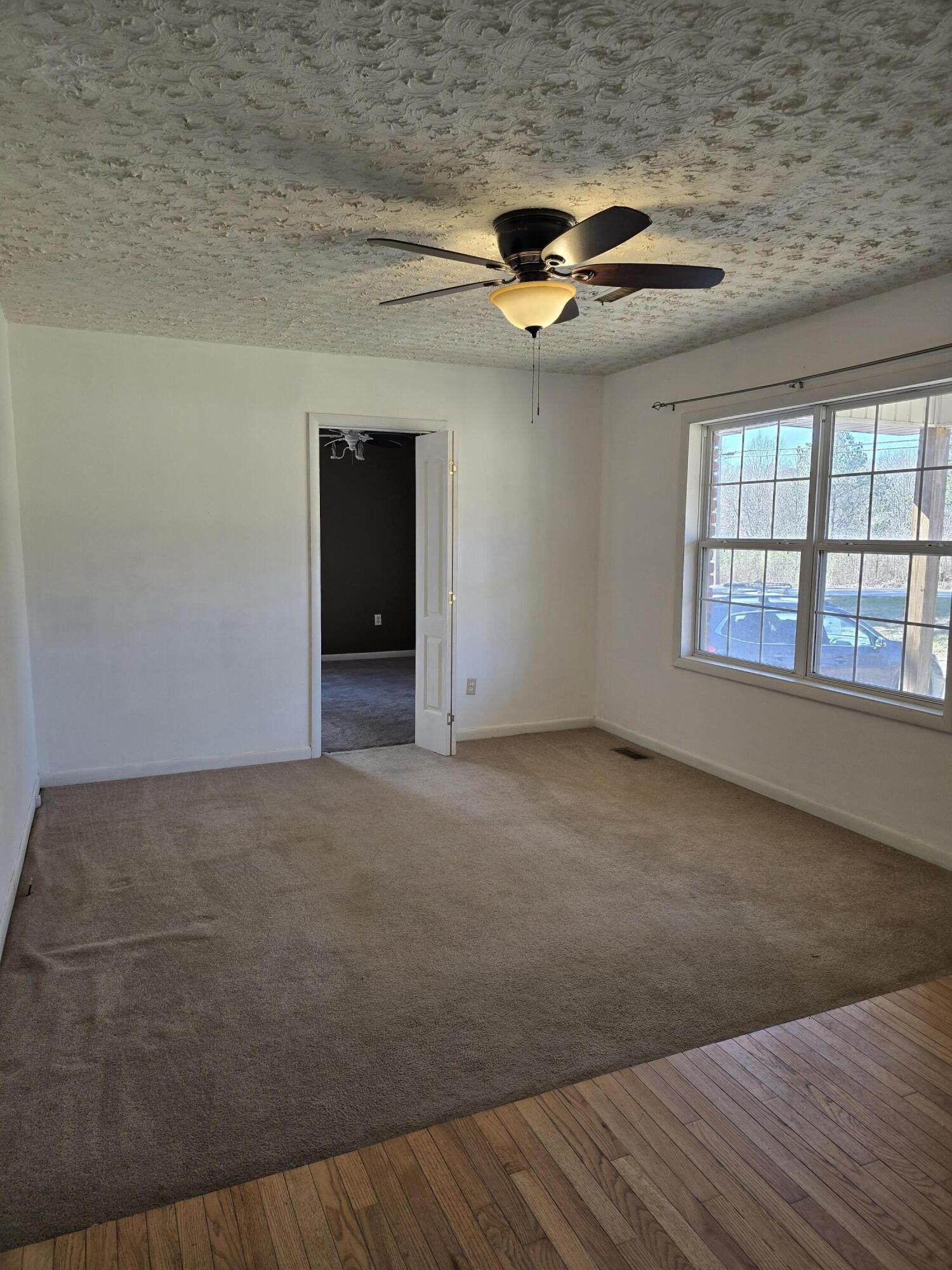 6063 Spring Place Road Southeast Cleveland, TN 37323 - Photo 5 of 44 a view of an empty room with a window