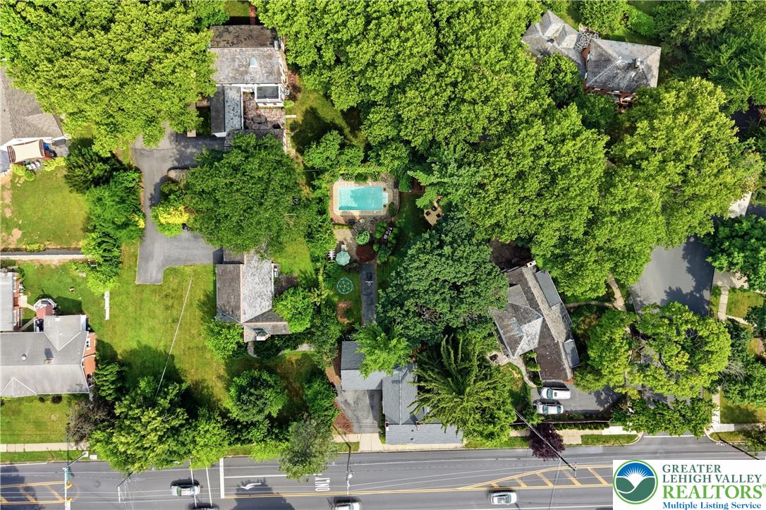 2014 Linden Street Bethlehem, PA 18017 - Photo 4 of 85 An aerial perspective reveals a private oasis, complete with a refreshing in-ground pool nestled amidst mature trees.