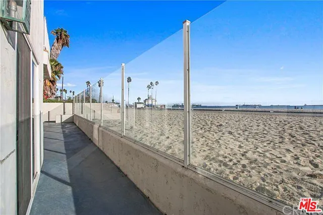 a view of a balcony with an ocean view