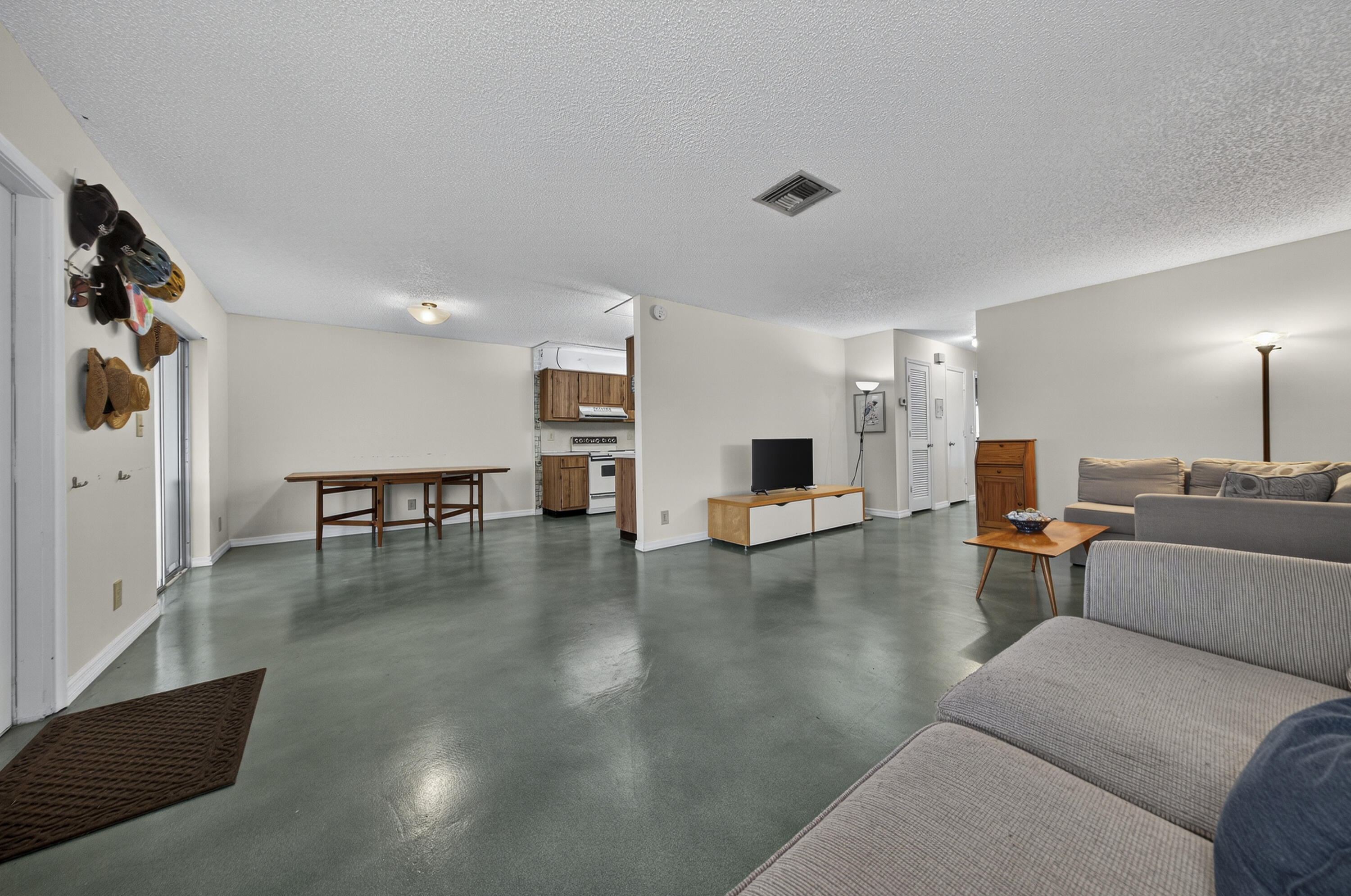 14236 Campanelli Drive Delray Beach, FL 33484 - Photo 16 of 33 a living room with furniture and a table