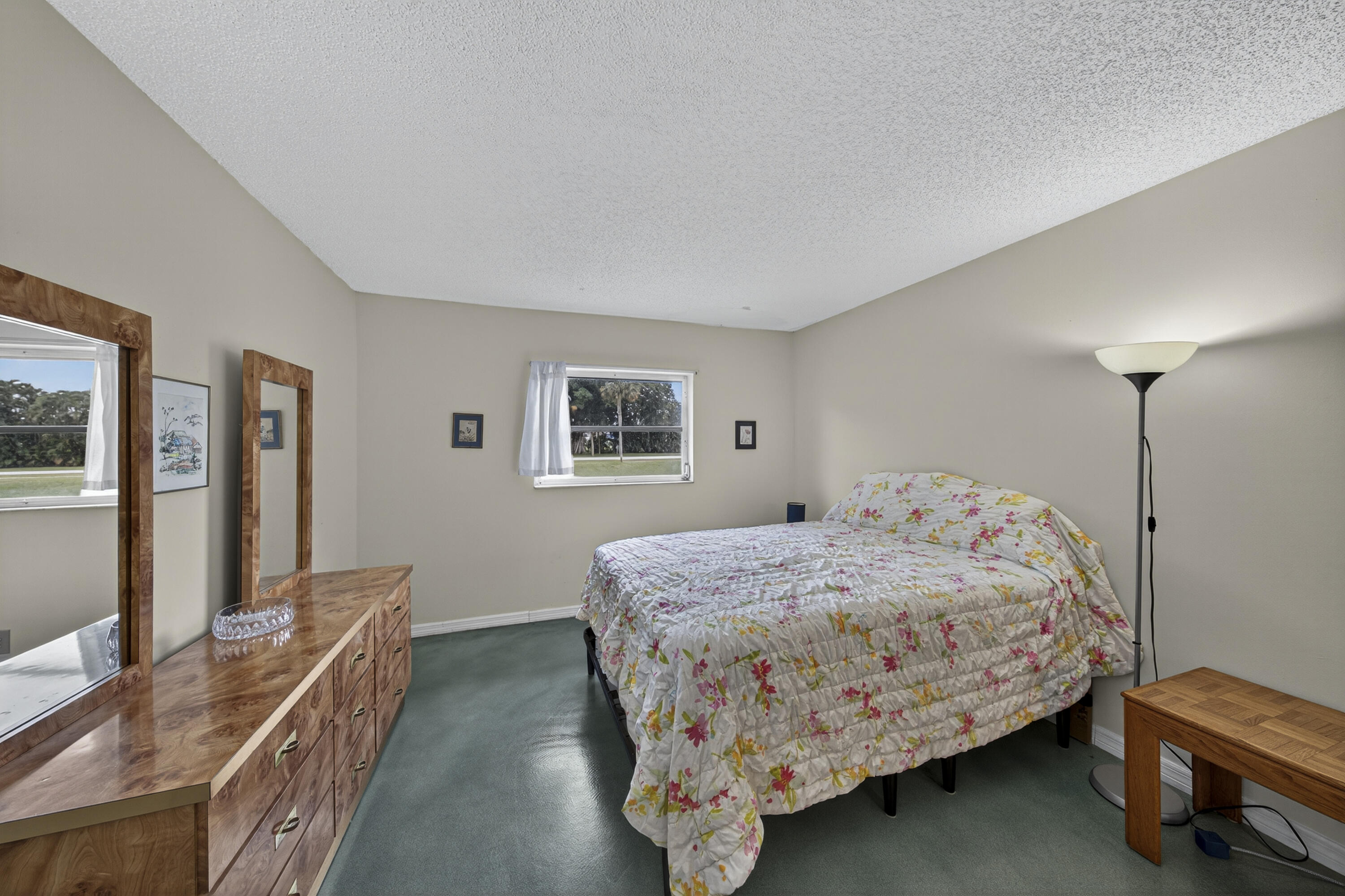 14236 Campanelli Drive Delray Beach, FL 33484 - Photo 17 of 33 a bedroom with a bed and a dresser