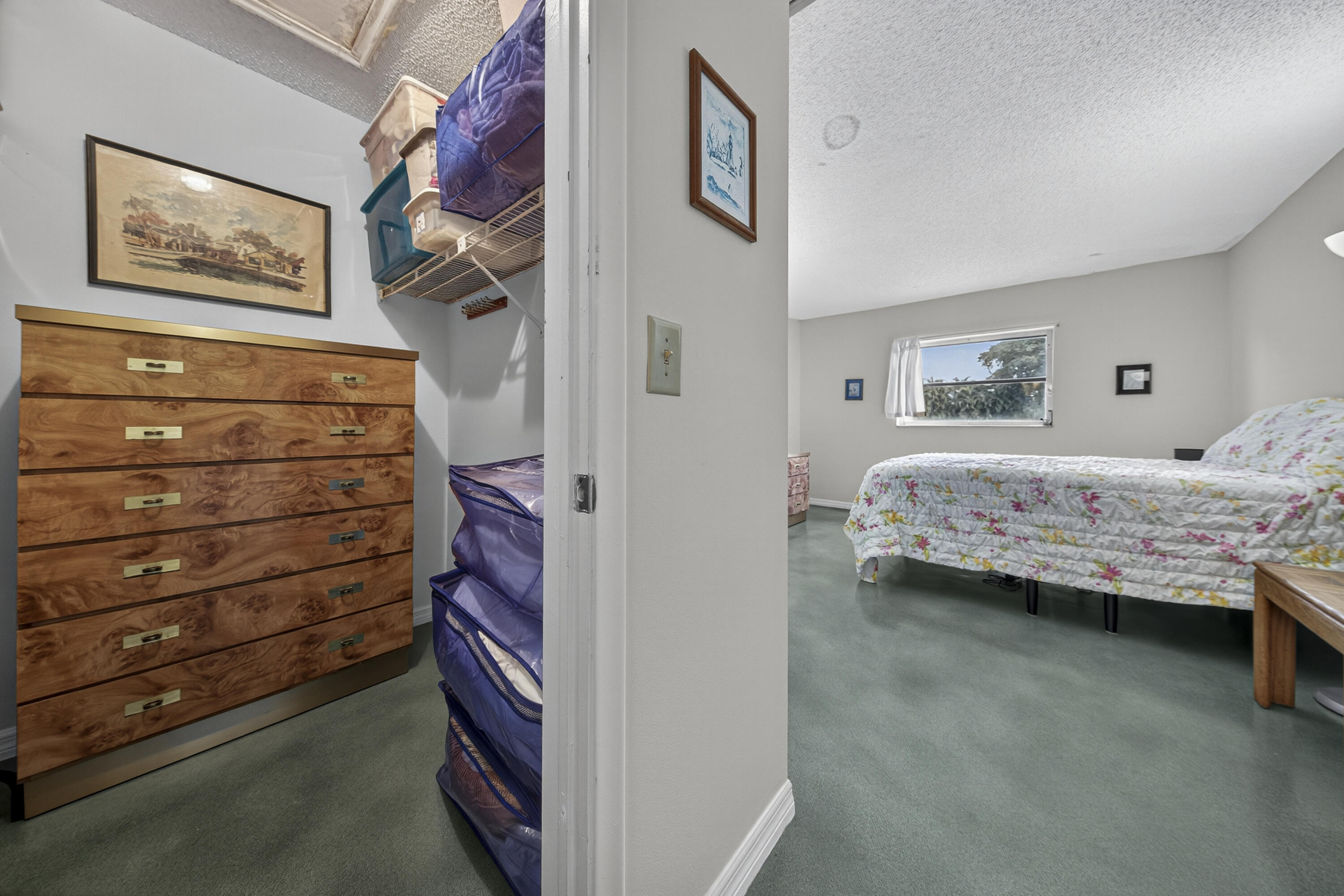 14236 Campanelli Drive Delray Beach, FL 33484 - Photo 19 of 33 a bedroom with a bed and a cabinets