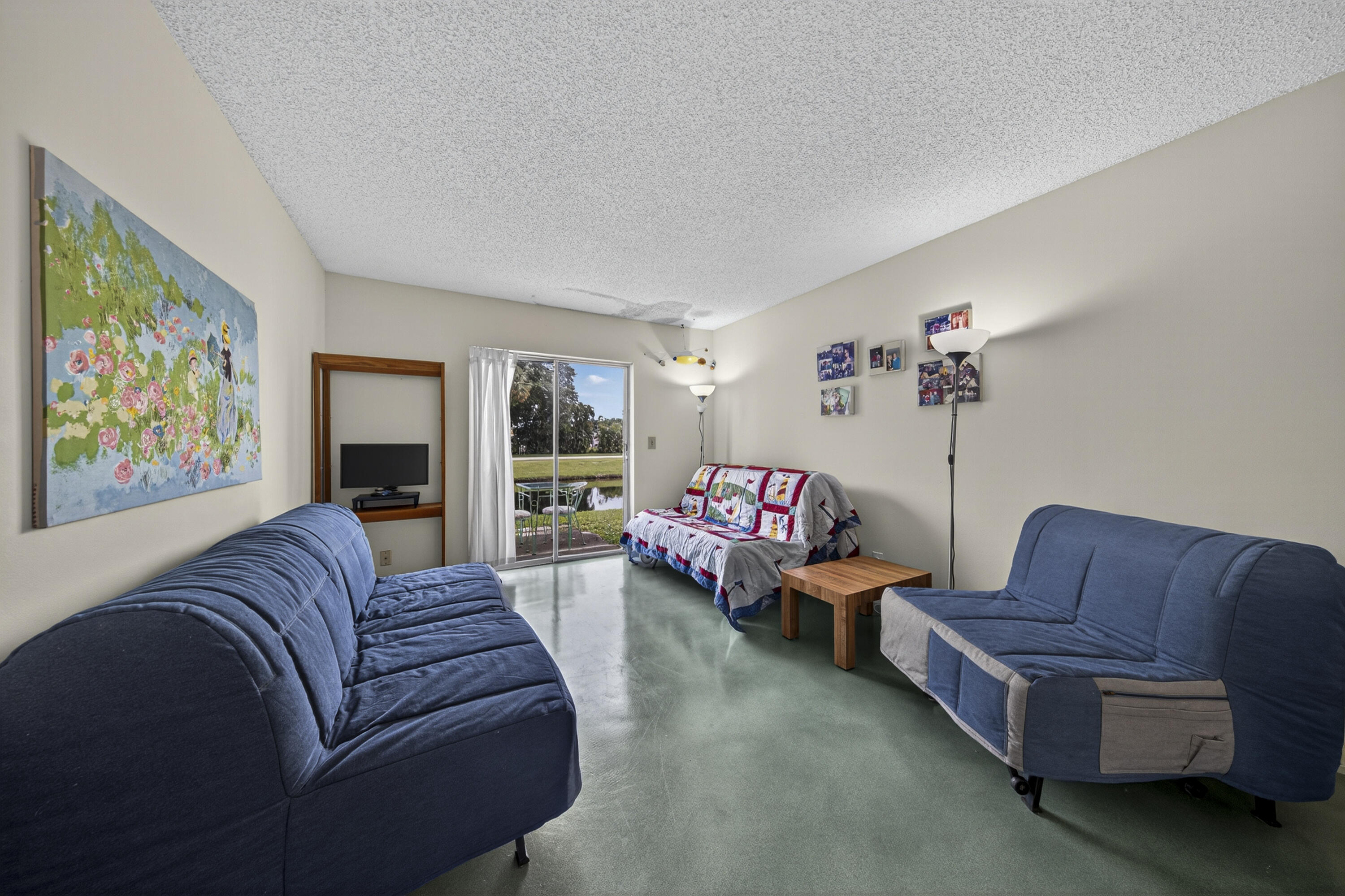 14236 Campanelli Drive Delray Beach, FL 33484 - Photo 21 of 33 a living room with furniture and a couch