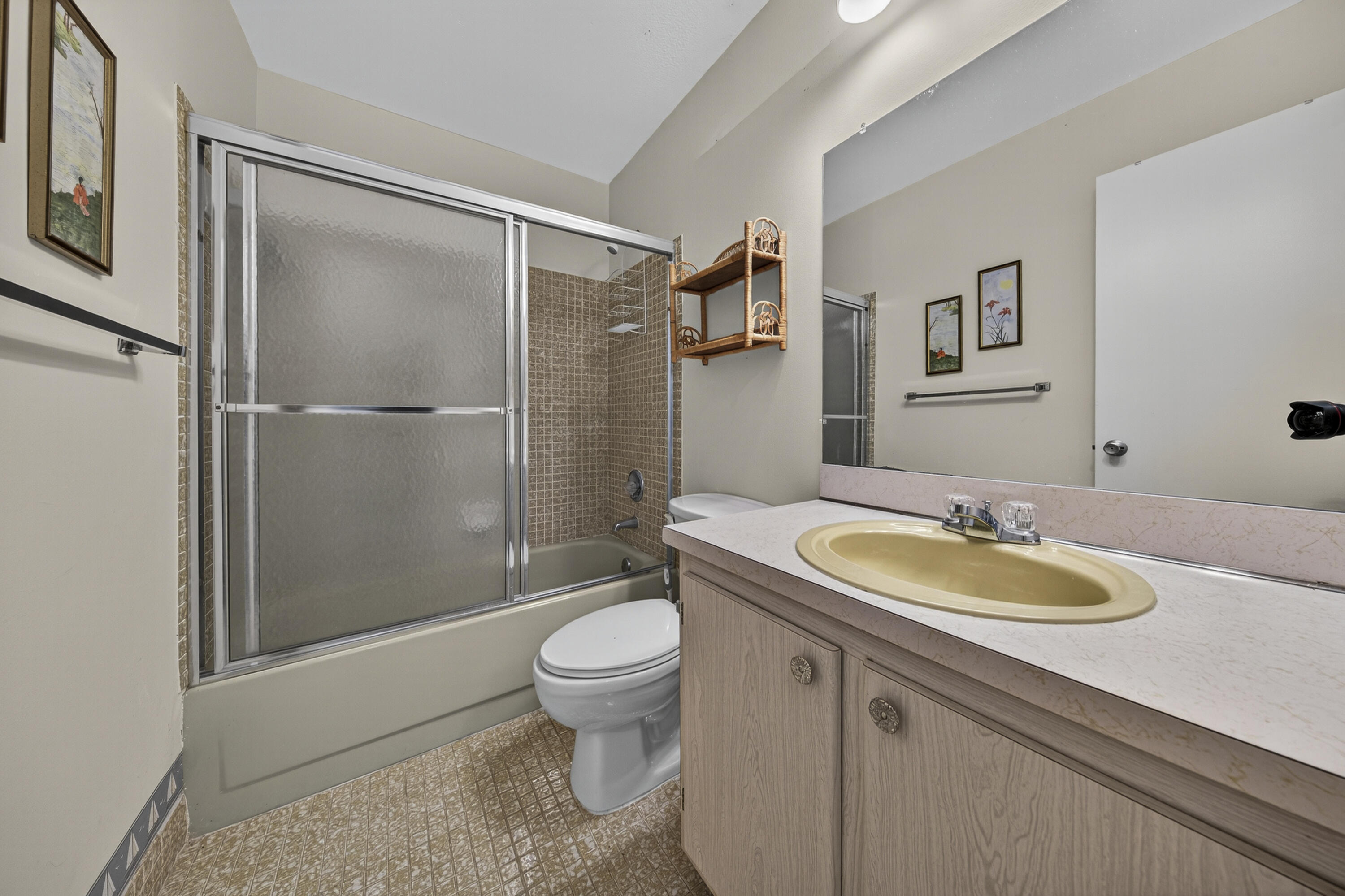 14236 Campanelli Drive Delray Beach, FL 33484 - Photo 23 of 33 a bathroom with a sink a toilet and shower