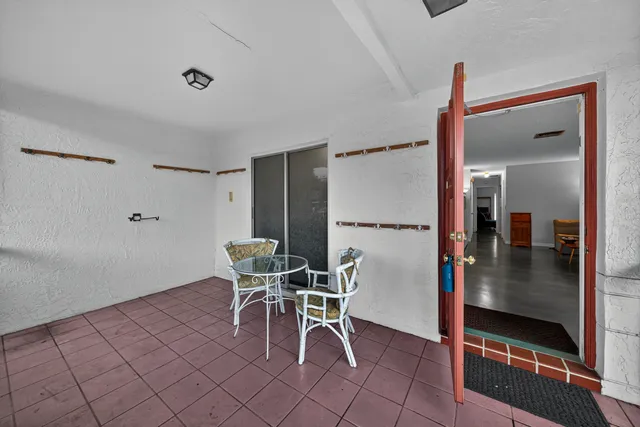 a dining room with furniture and a table