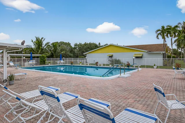a view of outdoor space and swimming pool