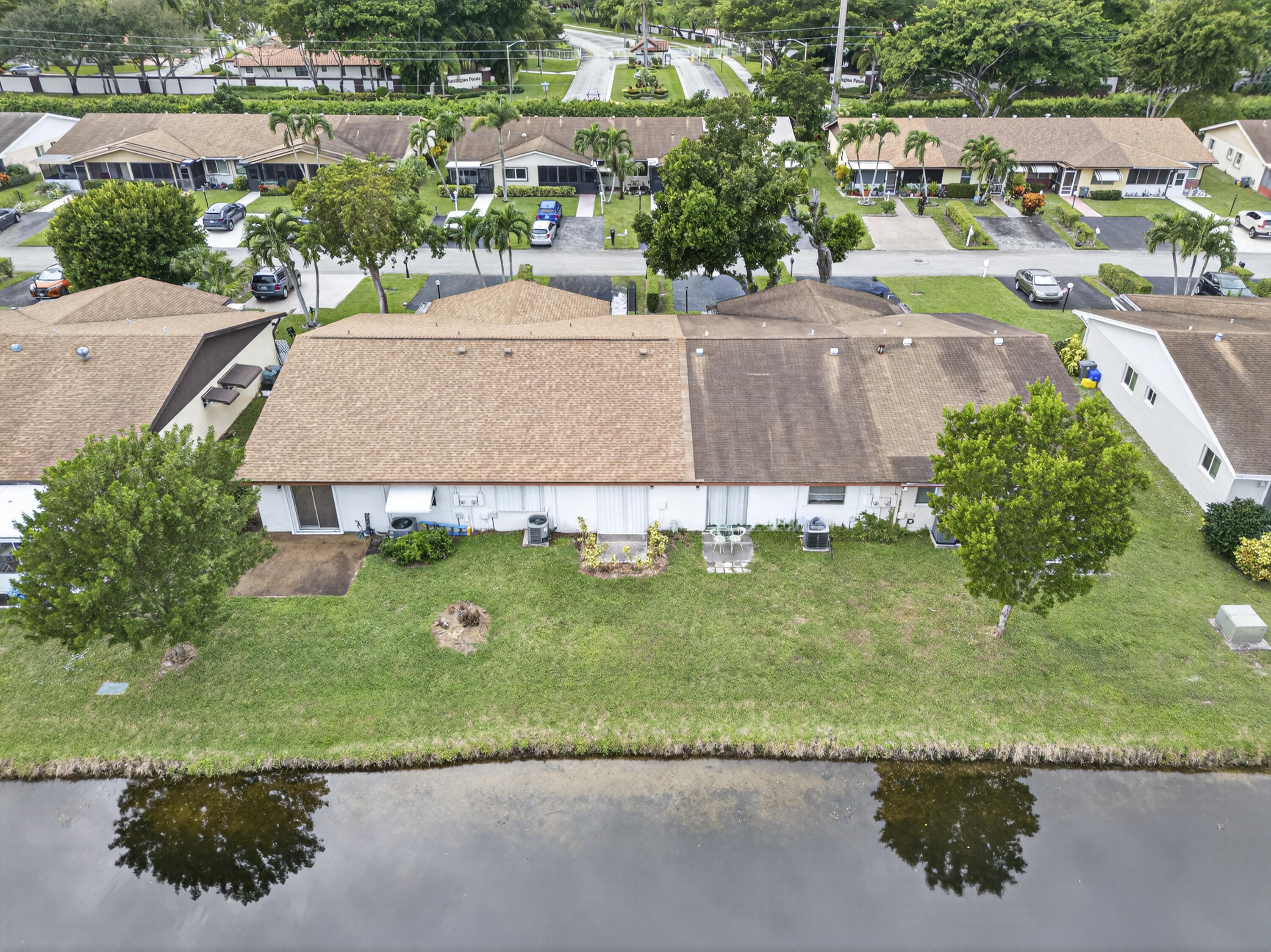 14236 Campanelli Drive Delray Beach, FL 33484 - Photo 33 of 33 an aerial view of a house with a garden and a yard