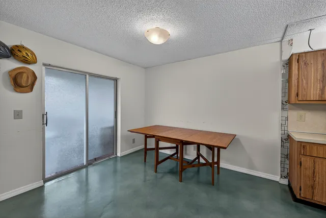 a room with furniture and a window