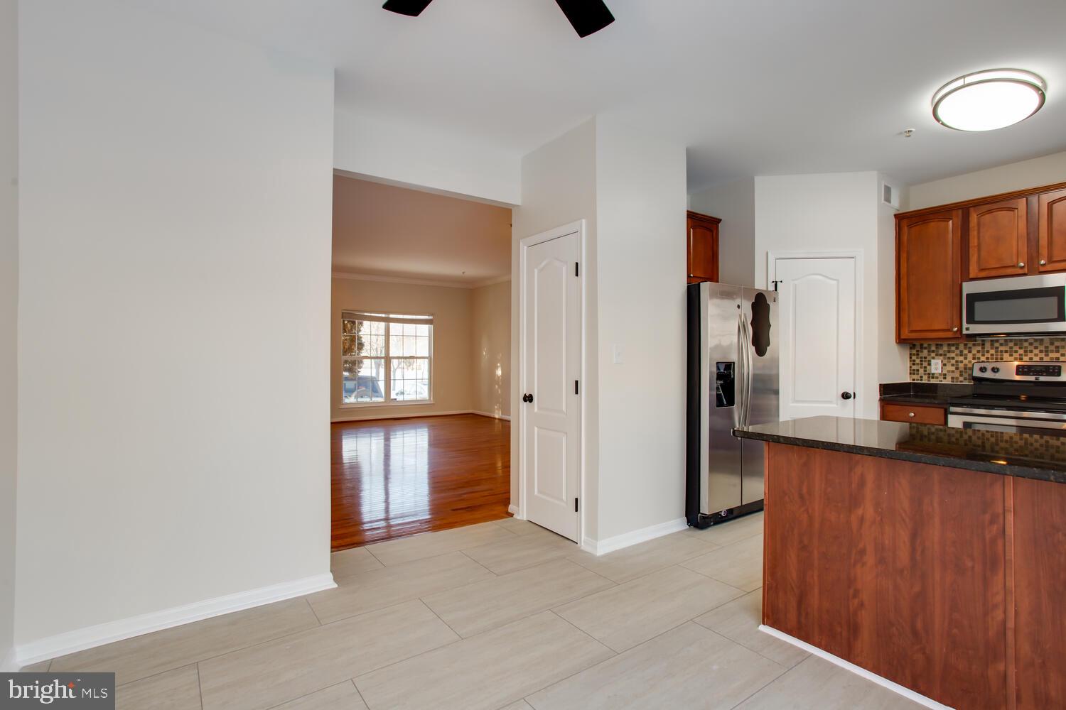 7024 Commander Howe Terrace Brandywine, MD 20613 - Photo 13 of 34 a view of a kitchen and an entryway