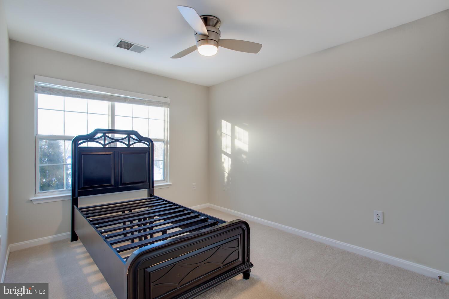 7024 Commander Howe Terrace Brandywine, MD 20613 - Photo 24 of 34 a view of room with window and ceiling fan