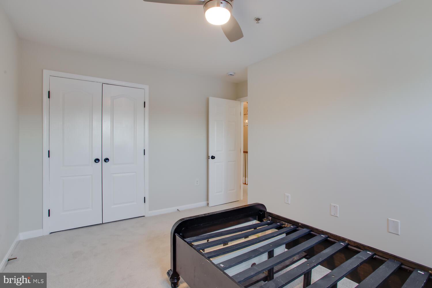 7024 Commander Howe Terrace Brandywine, MD 20613 - Photo 25 of 34 a view of a room with wooden floor and white walls
