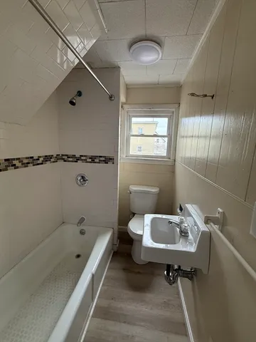 a bathroom with a sink and a stove