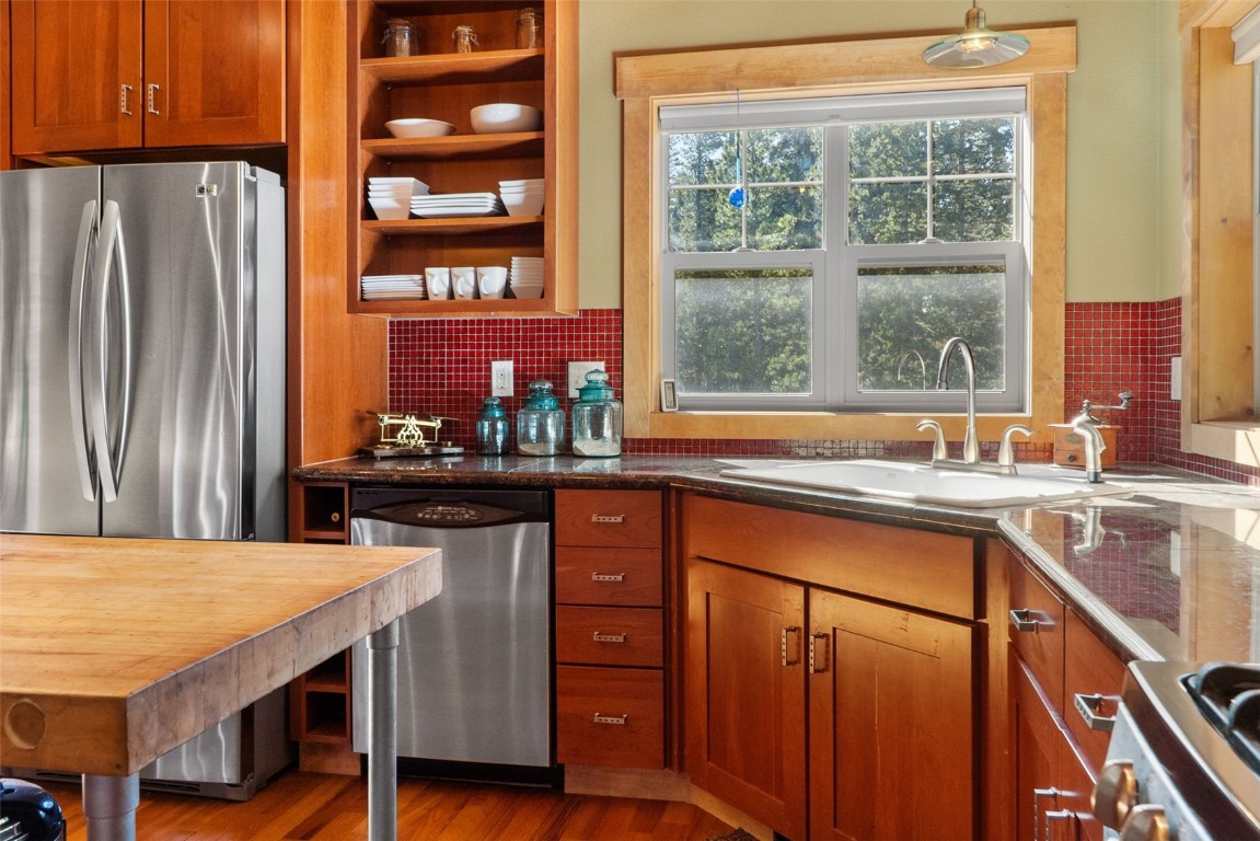 44 Gold Trail Circle Fairplay, CO 80440 - Photo 12 of 40 a kitchen with stainless steel appliances granite countertop a sink and a refrigerator