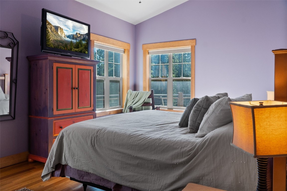 44 Gold Trail Circle Fairplay, CO 80440 - Photo 15 of 40 a bedroom with a bed and wooden floor