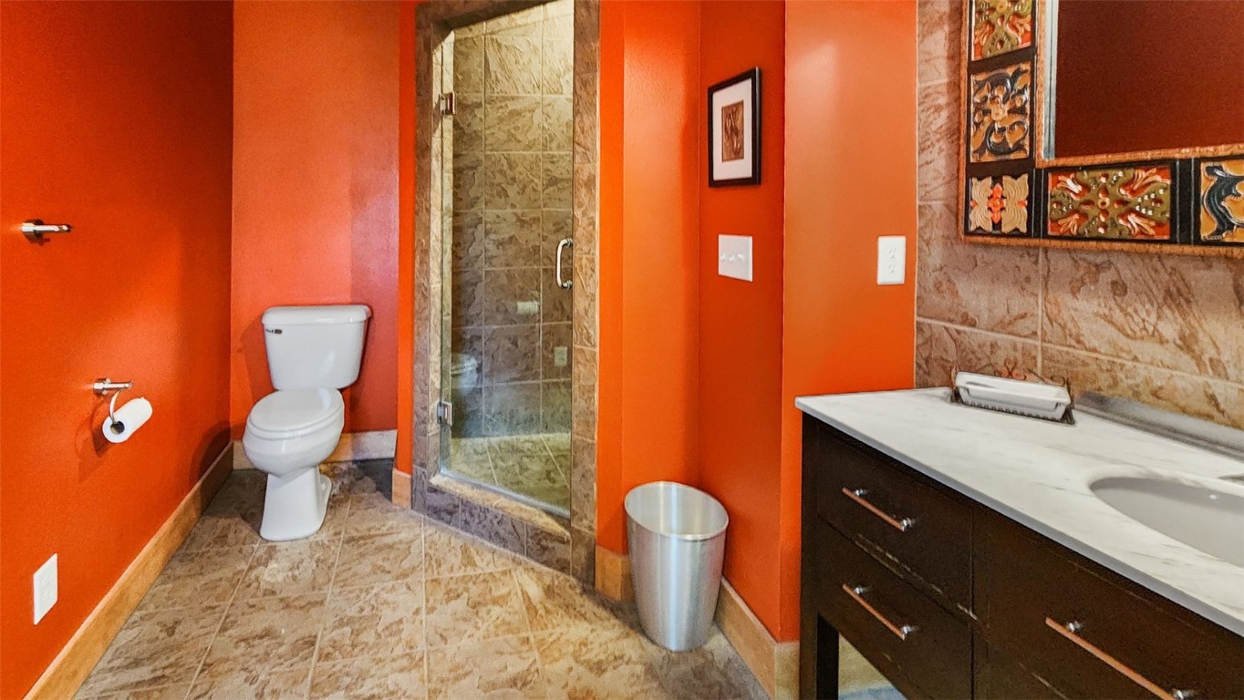 44 Gold Trail Circle Fairplay, CO 80440 - Photo 17 of 40 a bathroom with a sink a toilet and shower