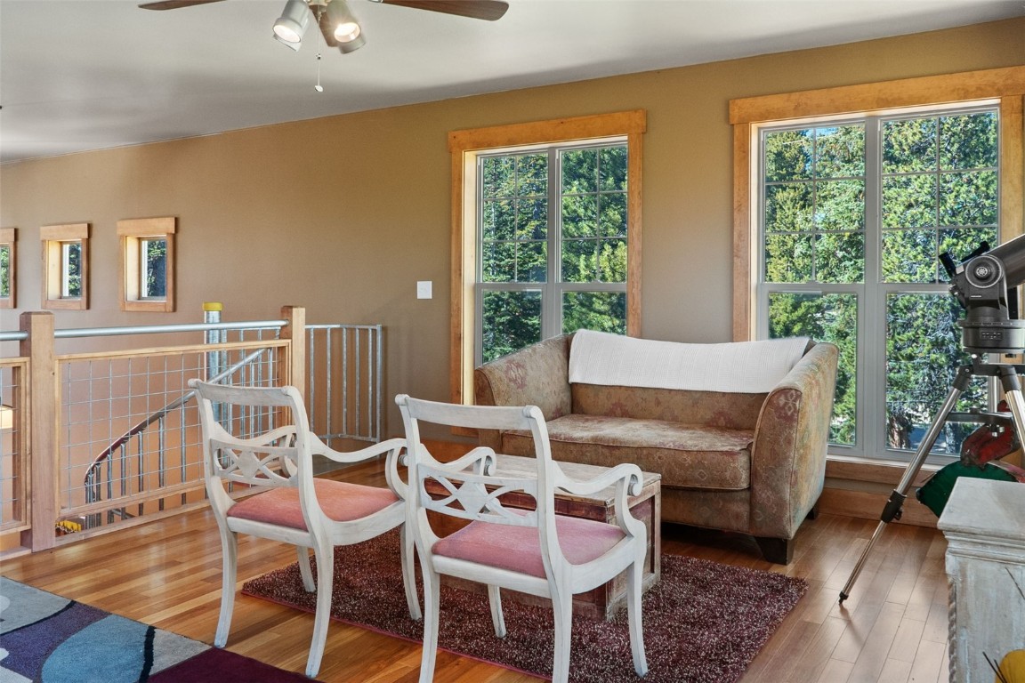 44 Gold Trail Circle Fairplay, CO 80440 - Photo 24 of 40 a living room with furniture a flat screen tv and a floor to ceiling window