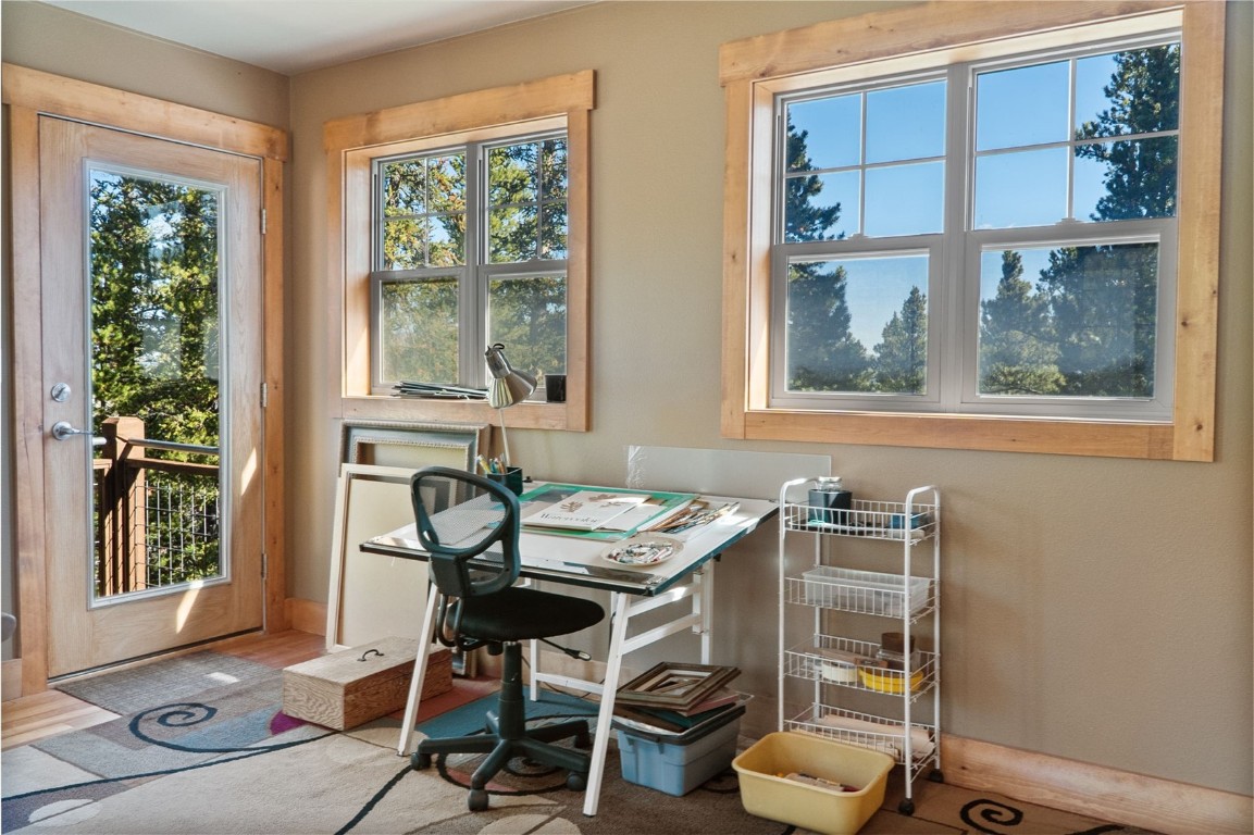 44 Gold Trail Circle Fairplay, CO 80440 - Photo 26 of 40 a table and chairs in a room and a window