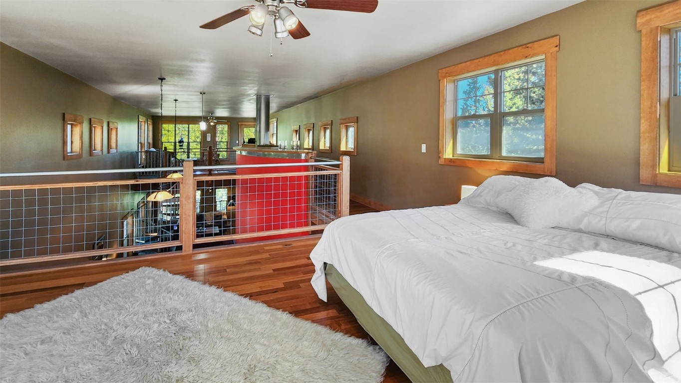 44 Gold Trail Circle Fairplay, CO 80440 - Photo 29 of 40 a bedroom with a bed and dresser with mirror