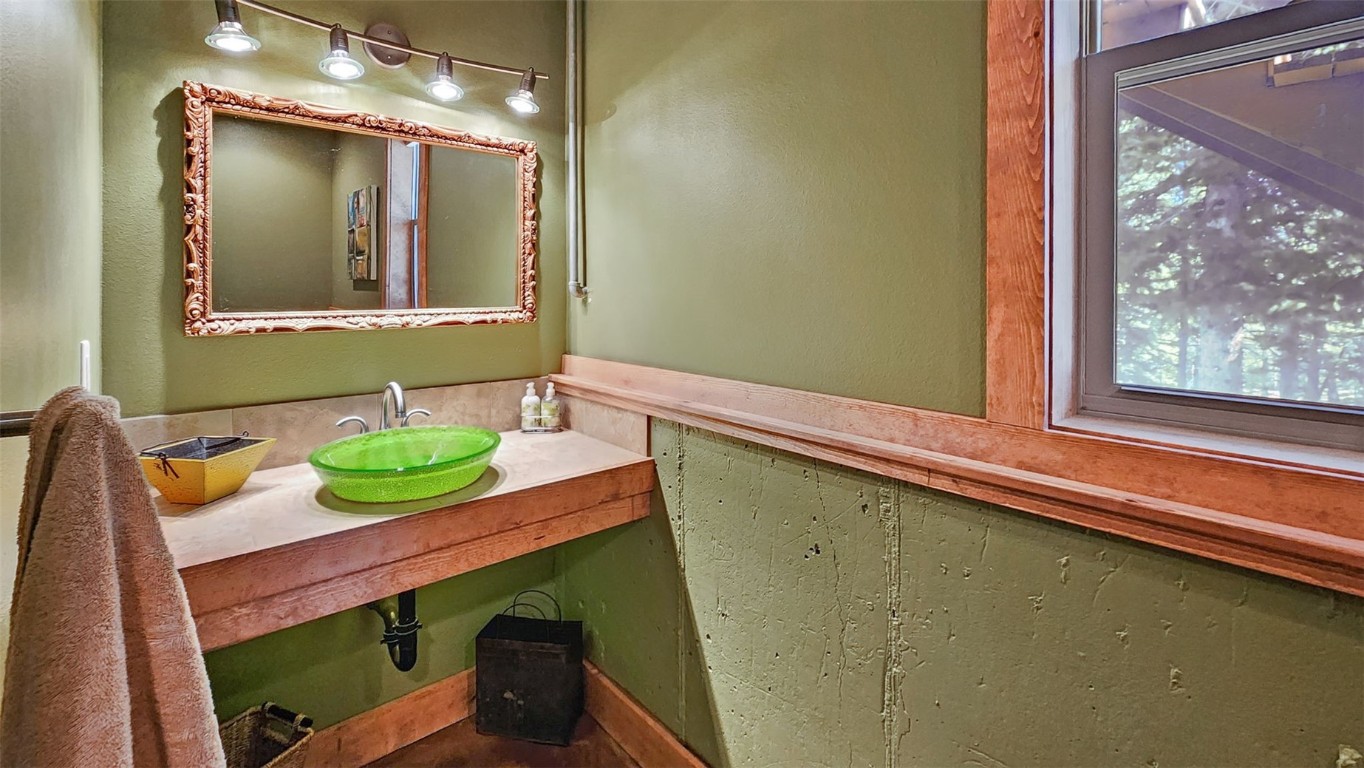 44 Gold Trail Circle Fairplay, CO 80440 - Photo 36 of 40 a bathroom with a sink and a mirror