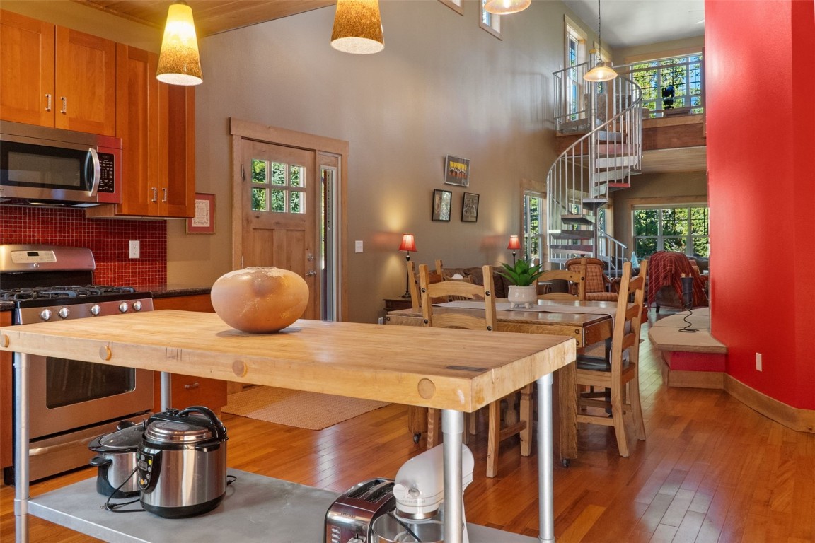44 Gold Trail Circle Fairplay, CO 80440 - Photo 9 of 40 a view of a dining room with furniture and wooden floor