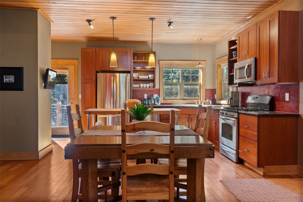 44 Gold Trail Circle Fairplay, CO 80440 - Photo 10 of 40 a view of a dining room with furniture and wooden floor