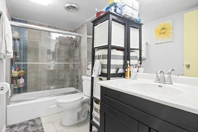 a bathroom with a sink a toilet and a bathtub