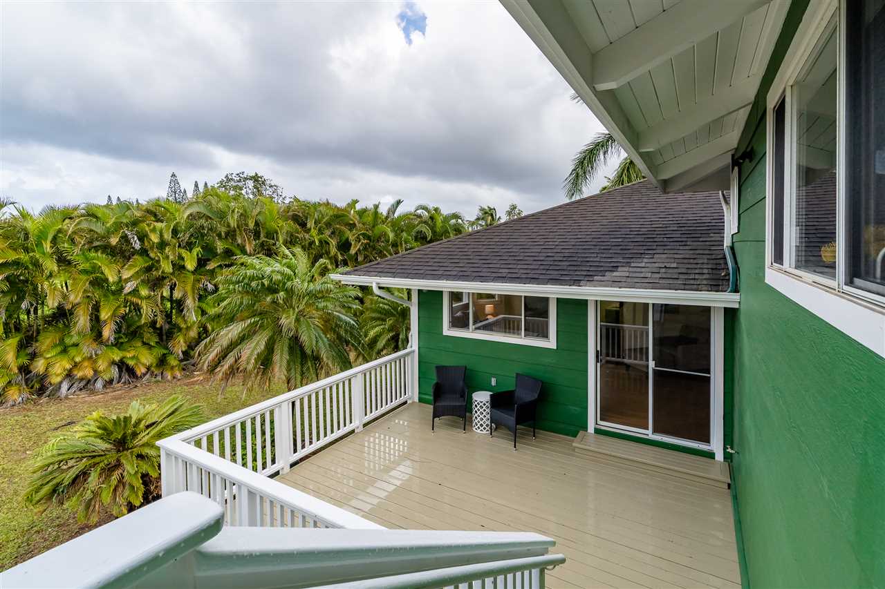 3175 Ua Noe Place, Unit A Haiku, HI 96708 - Photo 12 of 29 a view of backyard with deck and outdoor seating