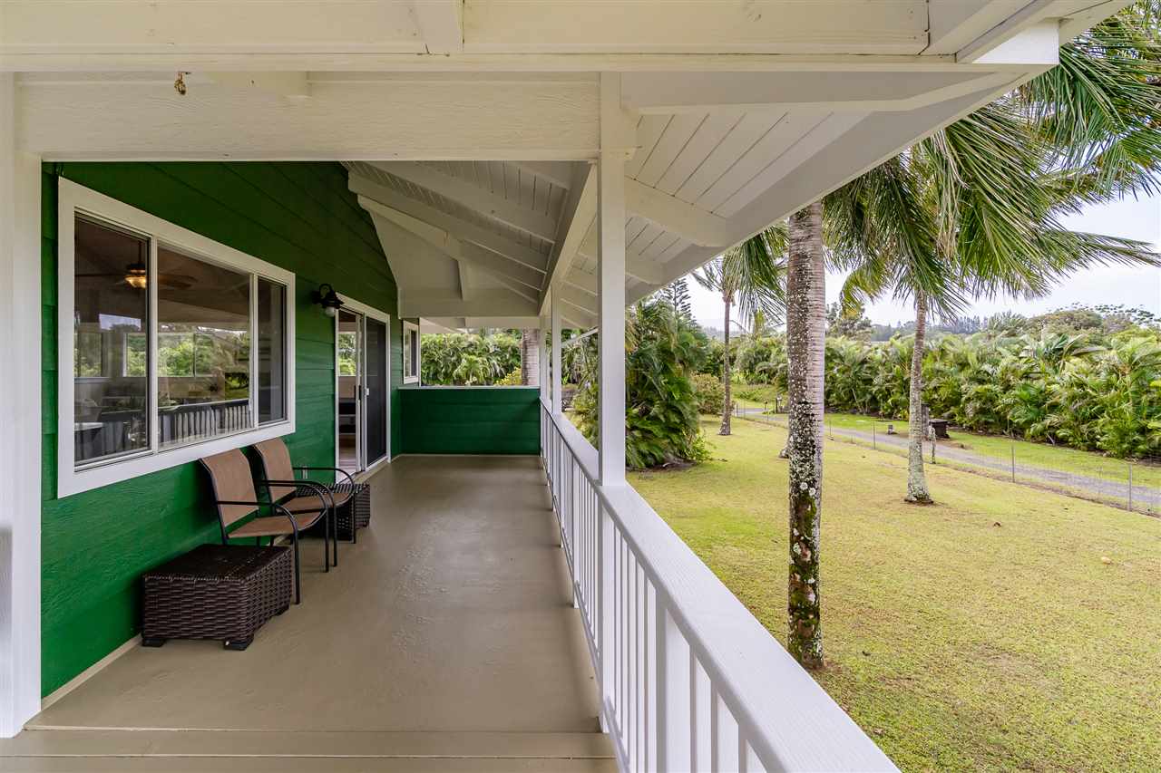 3175 Ua Noe Place, Unit A Haiku, HI 96708 - Photo 13 of 29 a view of a patio with a table and chairs